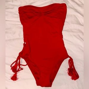 Red strapless one piece bathing suit